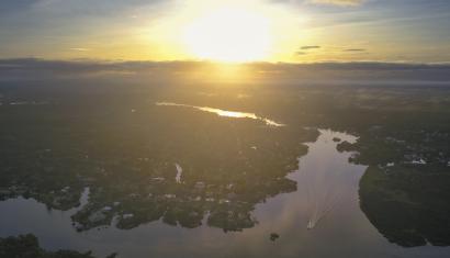 boat on water at sunset