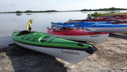 kayaks on shore of st martins marsh