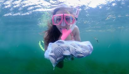 girl snorkeling for scallops
